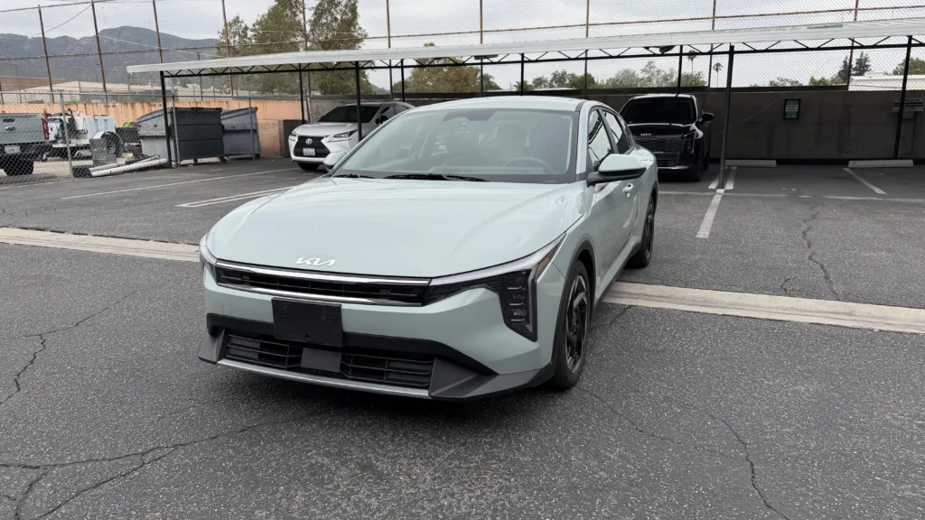2026 Kia K4 LXS Front Passenger-Side Angle